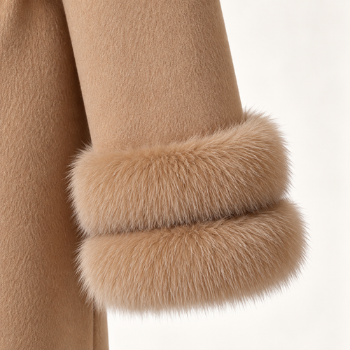 Close-up of Amara camel coat sleeve and double fur cuff