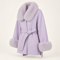 Lilas lilac wool coat with fox-fur collar and cuffs, three-quarter studio view