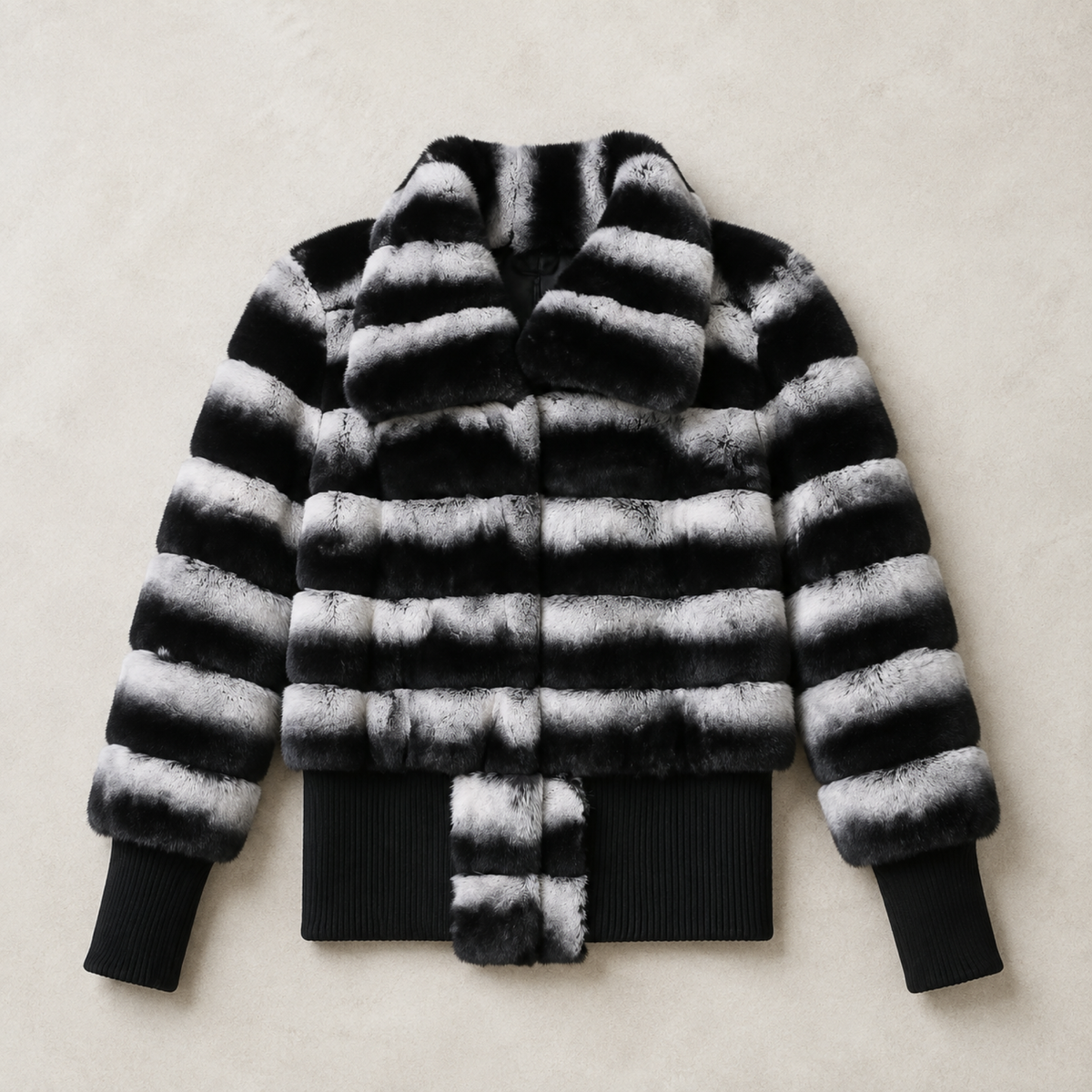 Noir Rex black and silver striped jacket, top-down flat lay.
