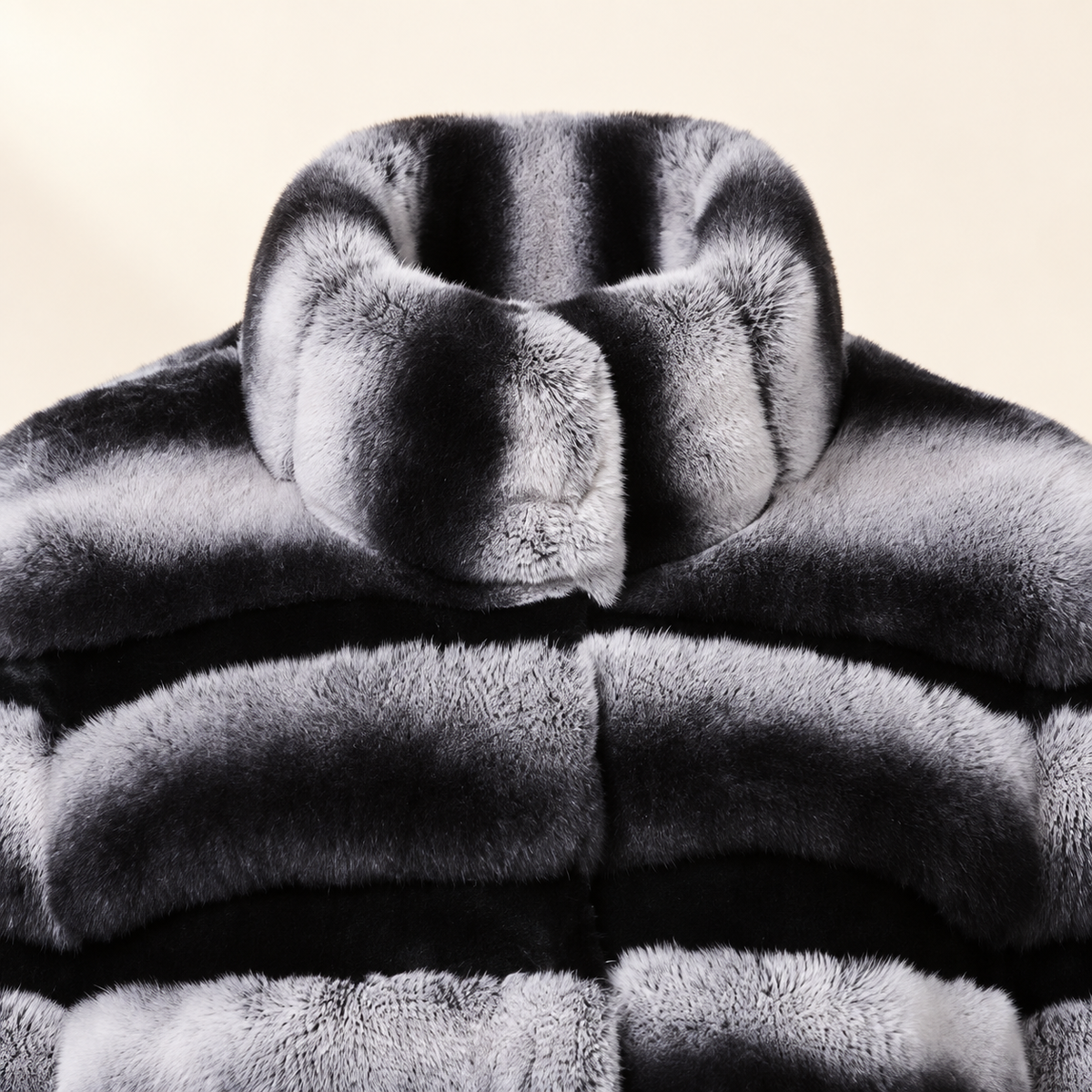 Close-up of Noire silver and black banded fur jacket collar